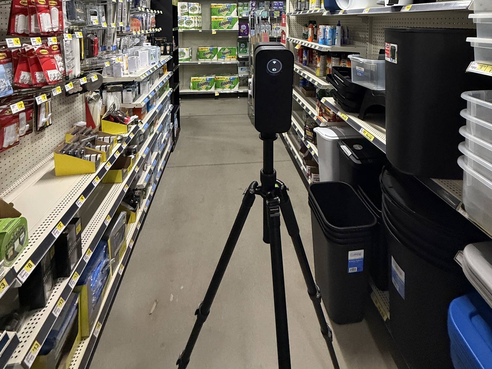 Estate360 3D scanner on a tripod capturing measured interior conditions on a commercial job.